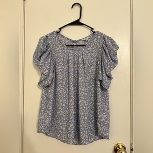 Iris brand blouse, size M, light blue with white and yellow flowers.